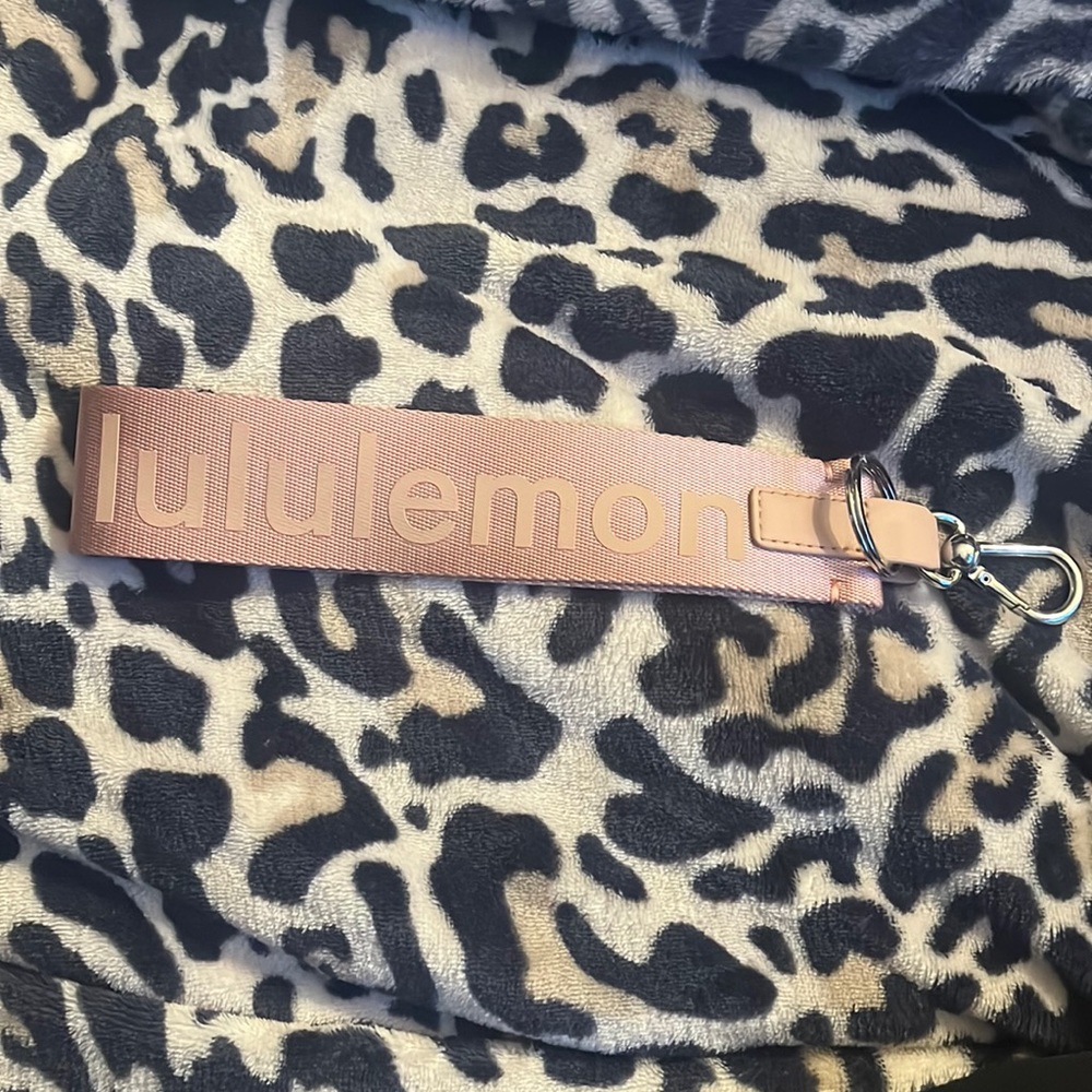 Brand new! Lululemon never lost keychain